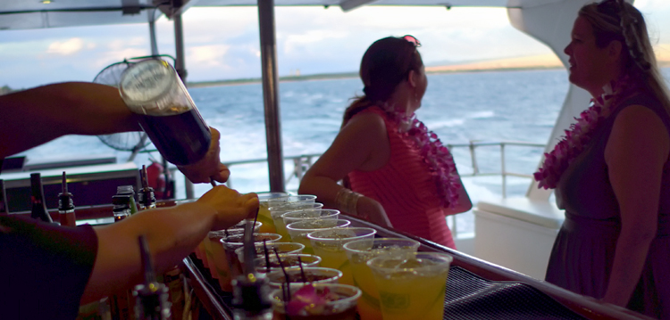 on pride bartender pours drinks