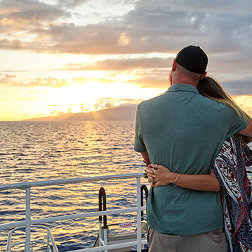 couple enjoying maui sunset amenities